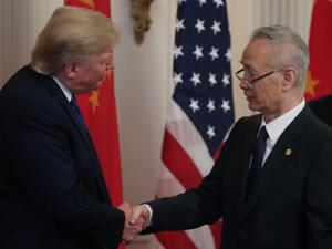 U.S. President Donald Trump shakes hands with Chinese Vice Premier Liu He, before signing the phase 1 of a trade deal between U.S. and China, in the East Room at the White House, on January 15, 2020 in Washington, DC.  (AFP/ File Photo)