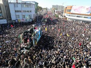Iranian mourners gather for the burial of slain top general Qassem Soleimani in his hometown of Kerman on Tuesday. (AFP/ File Photo)
