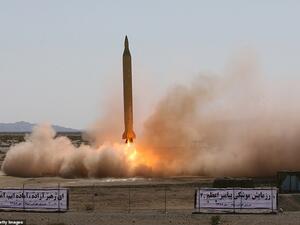 An Iranian long-range Shahab-3 missile is fired in desert terrain at an unspecified location in Iran on September 28, 2009. New documents show the regime was trying to develop nuclear warheads. (AFP/ File Photo)