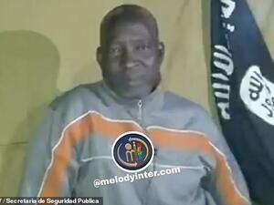 Reverend Lawan Andimi, a Christian pastor, pictured in a still from a Boko Haram video released before he was killed. Mr Andimi was abducted by the terror group earlier this month. (Video Screenshot)