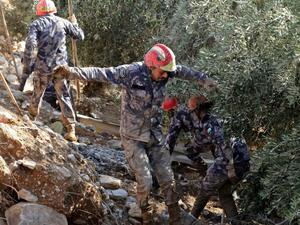 Jordanian rescue teams search for missing persons following flash floods in the city of Madaba on November 10, 2018. AFP