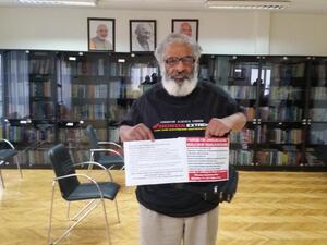 BV Narayana shows his brochure in English and Turkish explaining his causes for his second world tour in India's Istanbul consulate on December 31, 2019. (Credit: Murat Sofuoglu / TRTWorld)