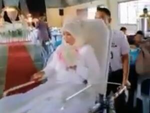 Couple arrives in ambulance for wedding (Facebook)