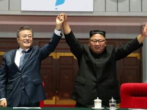 North Korean leader Kim Jong Un and South Korean President Moon Jae-in watch the large-scale gymnastic and artistic performance at the May Day Stadium in Pyongyang. (AFP/ File Photo)