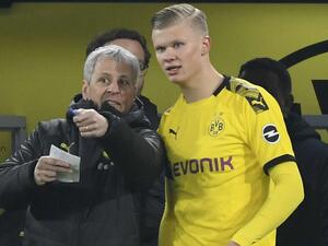 هالاند (يمين) يواصل التألق