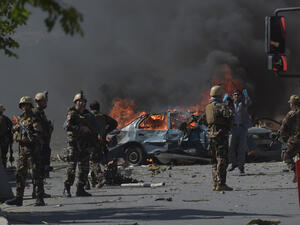 Afghan security forces personnel are seen at the site of a car bomb attack in Kabul on May 31, 2017. (Shah Marai/AFP/Getty Images)