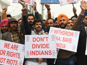 Activists of the Youth Congress hold placards and shout slogans during a protest against India's new citizenship law in Amritsar on December 24, 2019 AFP