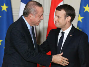 French President Emmanuel Macron with Turkish President Erdogan. (AFP)