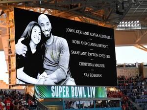 A tribute to Kobe Bryant and the victims of the helicopter crash is seen on a screen ahead of Super Bowl LIV between the Kansas City Chiefs and the San Francisco 49ers at Hard Rock Stadium in Miami Gardens, Florida, on February 2, 2020. Angela Weiss / AFP