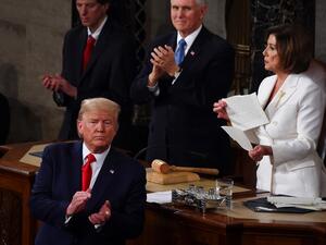 Speaker of the US House of Representatives Nancy Pelosi rips a copy of US President Donald Trumps speech after he delivered the State of the Union address at the US Capitol in Washington, DC, on February 4, 2020. Olivier DOULIERY / AFP