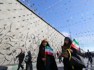 Iranians attend commemorations marking 41 years since the Islamic Revolution in the capital Tehran's Azadi Square on February 11, 2020. Thousands of Iranians massed for commemorations marking 41 years since the Islamic Revolution, in a show of unity at a time of heightened tensions with the United States. The celebrations mark the day that Shiite cleric Khomeini returned from exile and ousted the shah's last government. ATTA KENARE / AFP