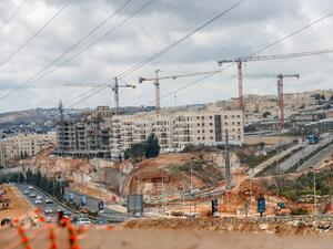 A picture taken on February 11, 2020 shows a view of ongoing construction work at Ramat Shlomo, a Jewish settlement in the Israeli-annexed eastern sector of Jerusalem. AHMAD GHARABLI / AFP