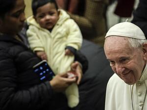 Pope Francis (R) meets with attendees during the weekly general audience on February 12, 2020 at Paul-VI hall in the Vatican. Filippo MONTEFORTE / AFP