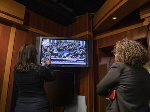 Reporters take photos of the television as they watch the Senate vote on whether or not to acquit President Donald Trump on the two articles of impeachment brought by the House of Representatives to the Senate for trial on Capitol Hill on February 5, 2020 in Washington, DC. After the House impeached Trump last year, the Senate voted today on whether to acquit or convict the President on two articles of impeachment as the trial concludes. Samuel Corum/Getty Images/AFP Samuel Corum / GETTY IMAGES NORTH AMERIC