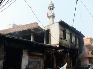The mosque was set on fire in the Indian capital on Tuesday by Hindu mobs [Sajjad Hussain/AFP] 