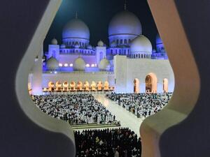 Through the crenellations of the Sheikh Zayed Grand Mosque in Abu Dhabi. AFP