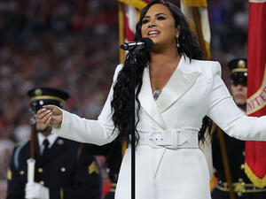 In November 2008 at the age of 16 she belted out the national anthem at a Dallas Cowboys game.
