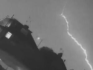 A British man's home security camera captured the moment lightning struck a passenger plane moments after it took off from a nearby airport. (Video Screenshot)