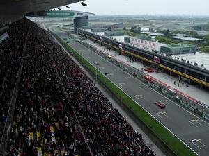 This general view shows spectators watching the Formula One Chinese Grand Prix in Shanghai on April 14, 2019. WANG ZHAO / AFP