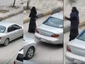 منقبة ترقص في الشارع العام