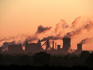In this file photo taken on May 22, 2019, vapour is pictured rising from British Steel's Scunthorpe plant at dawn in north Lincolnshire, north east England UK manufacturing activity rebounded in February to a ten-month high on easing Brexit uncertainty, but supply chains were nevertheless pressured by coronavirus concerns, data showed on March 2, 2020. The IHS Markit UK Manufacturing purchasing managers' index (PMI) stood at 51.7 last month, the group said in a statement. Lindsey Parnaby / AFP