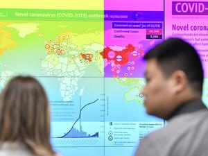 This picture taken on March 2, 2020 shows a display with a graphic updates on the progress of the coronavirus COVID-19 outbreak around the world, during a press conference held at the Emergency Response Coordination Centre in Brussels, on the EU response to COVID-19, on March 2, 2020. The European Union's disease control agency has increased its risk level for the novel coronavirus COVID-19 from moderate to high, EU Commission president Ursula von der Leyen said on March 2, 2020. JOHN THYS / AFP