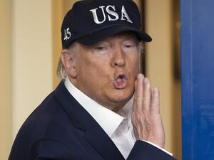 US President Donald Trump speaks to reporters during a press briefing about the Coronavirus (COVID-19) alongside members of the Coronavirus Task Force in the Brady Press Briefing Room at the White House in Washington, DC, March 14, 2020. President Donald Trump says he has taken coronavirus test, no result yet. JIM WATSON / AFP