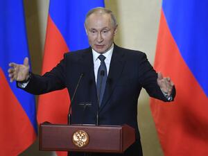 Russian President Vladimir Putin gives a speech during an awards ceremony for those who led the construction of the 19 kilometres (12 miles) road and rail Crimean Bridge over the Kerch Strait - that links mainland Russia to Moscow-annexed Crimea - in Sevastopol, Crimea, on March 18, 2020. Alexander NEMENOV / AFP / POOL