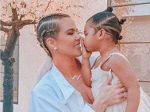 Denied! Khloé Kardashian, 35, posted a cute picture of her going in for a kiss and getting block by her 22-month-old daughter True Thompson on Friday (Instagram)