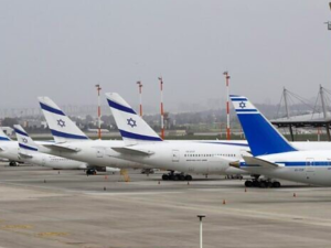 El Al Airlines' Boeing 737s are pictured on the tarmac at Ben Gurion International Airport near Tel Aviv, March 10, 2020. (Jack Guez/AFP)