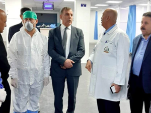 Jordan Health Minister Saad Jaber(C) With Al Bashir Hospital Doctors in Amman earlier in February (Courtesy of Health Ministry Facebook page)