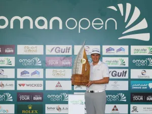 Valimaki with the Oman Open trophy