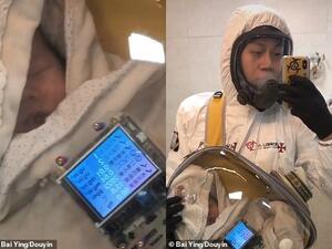A Chinese father, known by his nickname Bai Ying, has created a 'coronavirus safety pod' to protect his toddler son from catching the deadly virus while being outside. (Bai Ying)