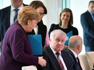 أنجيلا ميركل ووزير الداخلية الألماني "هورست زيهوفر"