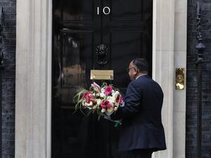 Flowers from the Pakistan embassy are delivered to 10 Downing Street in central London, on April 7, 2020 as Britain's Prime Minister Boris Johnson spent the nightin intensive care at St Thomas' Hospital with symptons of the novel coronavirus COVID-19. British Prime Minister Boris Johnson spent the night in intensive care after being admitted with a deteriorating case of coronavirus, prompting serious concerns on Tuesday about his health and the government's response to a still-escalating outbreak. Tolga AKM