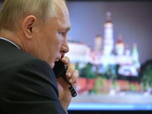 Russian President Vladimir Putin attends a meeting on the situation with the spread of the COVID-19 coronavirus disease in Russia, via a teleconference call at the Novo-Ogaryovo state residence outside Moscow on April 13, 2020. Alexey DRUZHININ / SPUTNIK / AFP