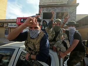 Fighters loyal to the UN-recognised Government of National Accord (GNA) gesture in celebration in the coastal city of Sabratha on April 13, 2020, after it seized two coastal cities between Tripoli and the Tunisian border from troops backing military commander Khalifa Haftar. "Our forces took control of Sorman and Sabratha and are pursuing (Haftar's forces)," said a statement by Mohammed Gnunu, spokesman for the forces of the United Nations-recognised Government of National Accord. Control of war-torn Libya 