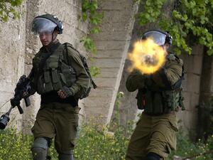 Israeli forces clash with Palestinian demonstrators following a weekly protest against the expropriation of Palestinian land by Israel, in the village of Kfar Qaddum in the Israeli-occupied West Bank, on April 17, 2020. JAAFAR ASHTIYEH / AFP