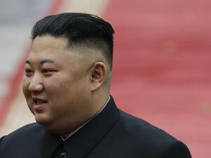 This file photo taken on March 1, 2019 shows North Korea's leader Kim Jong Un attending a welcoming ceremony at the Presidential Palace in Hanoi. A train likely belonging to North Korean leader Kim Jong Un has been spotted at a resort town in the country's east, satellite photos reviewed by a US-based think tank showed on April 26, 2020, as speculation persists over his health. KHAM / POOL / AFP
