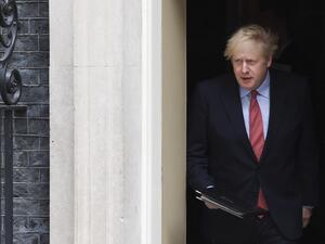 Britain's Prime Minister Boris Johnson walks out of 10 Downing Street to give a statement in central London on April 27, 2020 after returning to work following more than three weeks off after being hospitalised with the COVID-19 illness. (AFP)