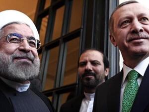 Recep Tayyip Erdogan (L) and Iranian President Hassan Rouhani. (AFP/File)