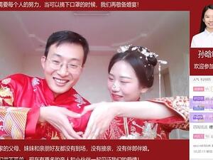 The groom, Liu Wenchao, tied the knot with his bride, Sun Hanxiao, on March 20, while millions of web users witnessed their special day on a Chinese video-sharing website Bilibili (Liu Wenchao/Bilibili/DailyMail)