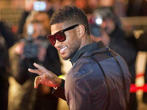 Usher on the red carpet of NRJ Music Award 2011 during the Midem. (Shutterstock/ File Photo)
