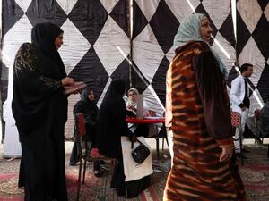 Egyptian doctors give medical advice to women and girls about Female Genital Mutilation (FGM) during an awareness campaign in Giza, on the outskirts of the capital Cairo on February 18, 2020. The UN says FGM is widespread in many countries across Africa, the Middle East and Asia, affecting the lives of millions of girls and women. In Sudan, rights campaigners say the custom has over the past three decades spread to remote regions where it was previously not practised, including Sudan's Nuba mountains. In ne