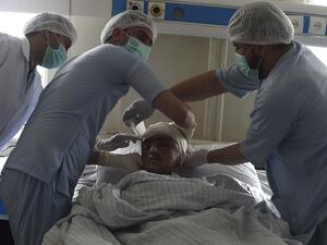 In this photo taken on March 16, 2020, wounded Afghan policeman Mujib Rahman receives treatment at the Afghan National Police Hospital in Kabul. Since the Taliban were ousted in a US-led invasion in 2001, about 37,000 police officers have been killed by the hardline Islamists and the Afghan National Police (ANP) remain the target of at least 70 percent of insurgent assaults, officials say. WAKIL KOHSAR / AFP