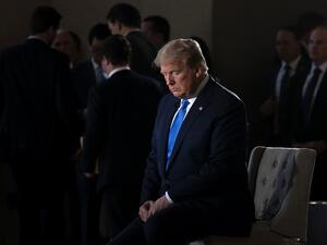 US President Donald Trump gestures during a commercial break of a Fox News virtual town hall "America Together: Returning to Work," event from the Lincoln Memorial in Washington, DC on May 3, 2020. Trump will answer questions submitted by viewers on Twitter, Facebook and Instagram. JIM WATSON / AFP