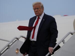 US President Donald Trump steps off Air Force One after returning from travel to Allentown, Pennsylvania during the coronavirus disease (COVID-19) pandemic at Joint Base Andrews, Maryland on May 14, 2020. CARLOS BARRIA / POOL / AFP