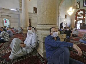 President Bashar al-Assad warned earlier this month of a "catastrophe" in war-battered Syria if the easing of lockdown measures against coronavirus is mishandled.  LOUAI BESHARA / AFP