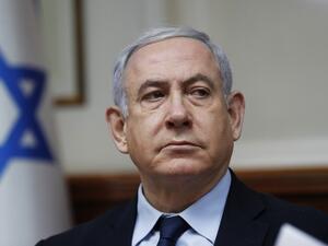 A file photo taken on February 9, 2020 shows Israeli Prime Minister Benjamin Netanyahu chairing the weekly cabinet meeting in Jerusalem. A new page in Israeli history opens Sunday as Prime Minister Benjamin Netanyahu becomes the first sitting premier to face criminal charges, accused of a string of corruption allegations he denies. After more than 500 days of electoral deadlock in which he fought for his political survival Netanyahu is to take his seat in the Jerusalem District Court for a new battle -- to 