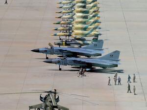 In this file photo taken on September 04, 2016 A picture taken on September 4, 2016 in the coastal city of Misrata shows Aero L-39 Albatros (top) and MIG-23 fighter jets (bottom) of the Libyan Air Force on the tarmac of the Air College, that was turned into an air base for jets targeting the positions of the Islamic State (IS) group in Sirte as well as in the north-central and north-western Libya. (AFP/File Photo)